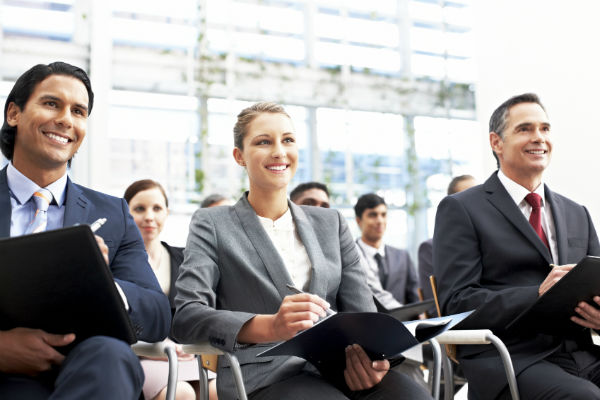 Happy professionals in classroom