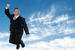 businessman-jump-sky-clouds